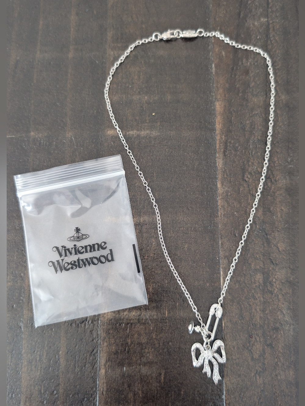 Vivienne Westwood Silver Bow Pendant Necklace with Sparkling Stones - Picture 5 of 10